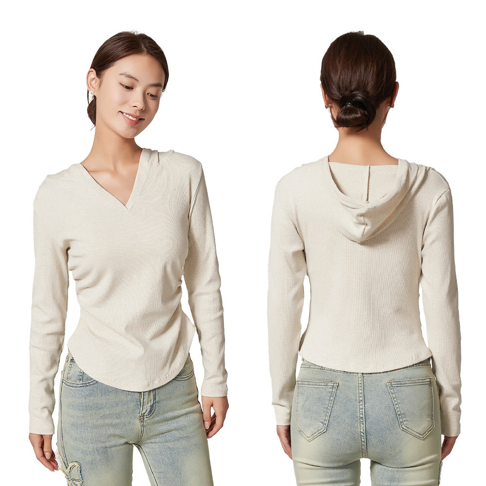 Ladies sporty top with hood and fitted cut