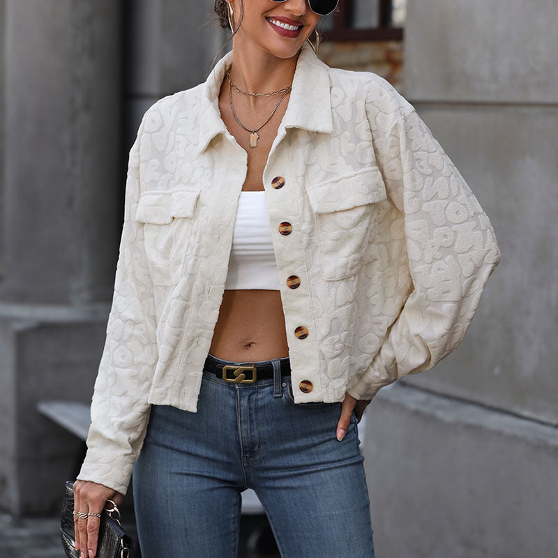 Ladies cropped jacket with textured fabric and practical pockets