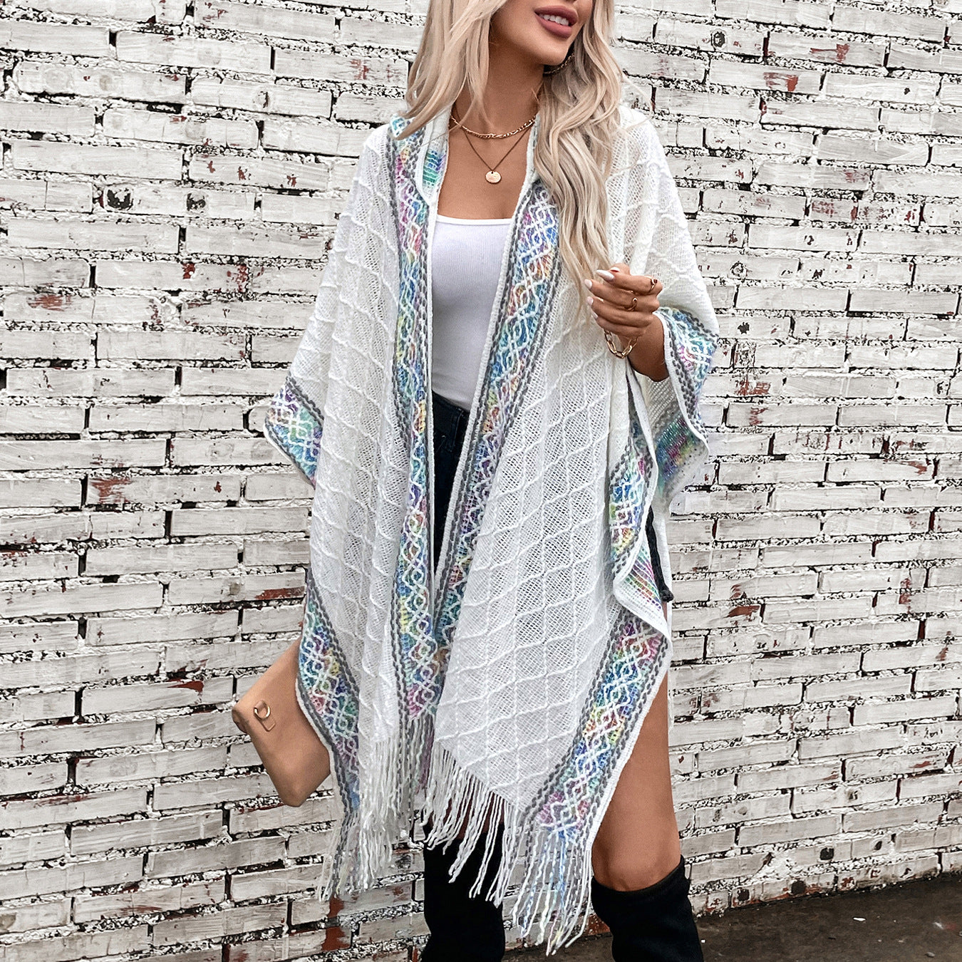 Women's elegant poncho with high-quality textured design and fringes