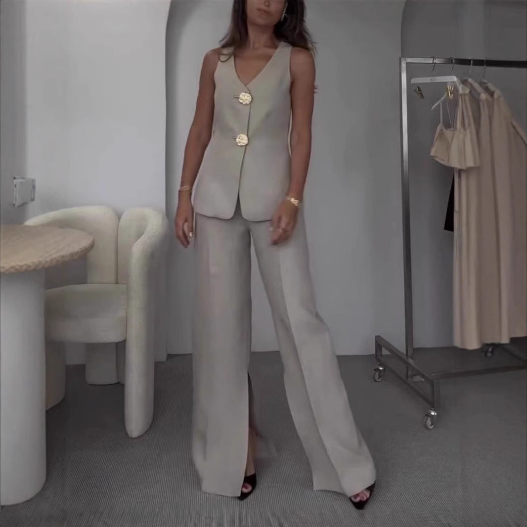 Ladies elegant pantsuit set with fitted blazer and wide-cut trousers