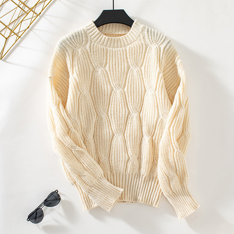 Women’s knit pullover with decorative cable design and comfortable fit