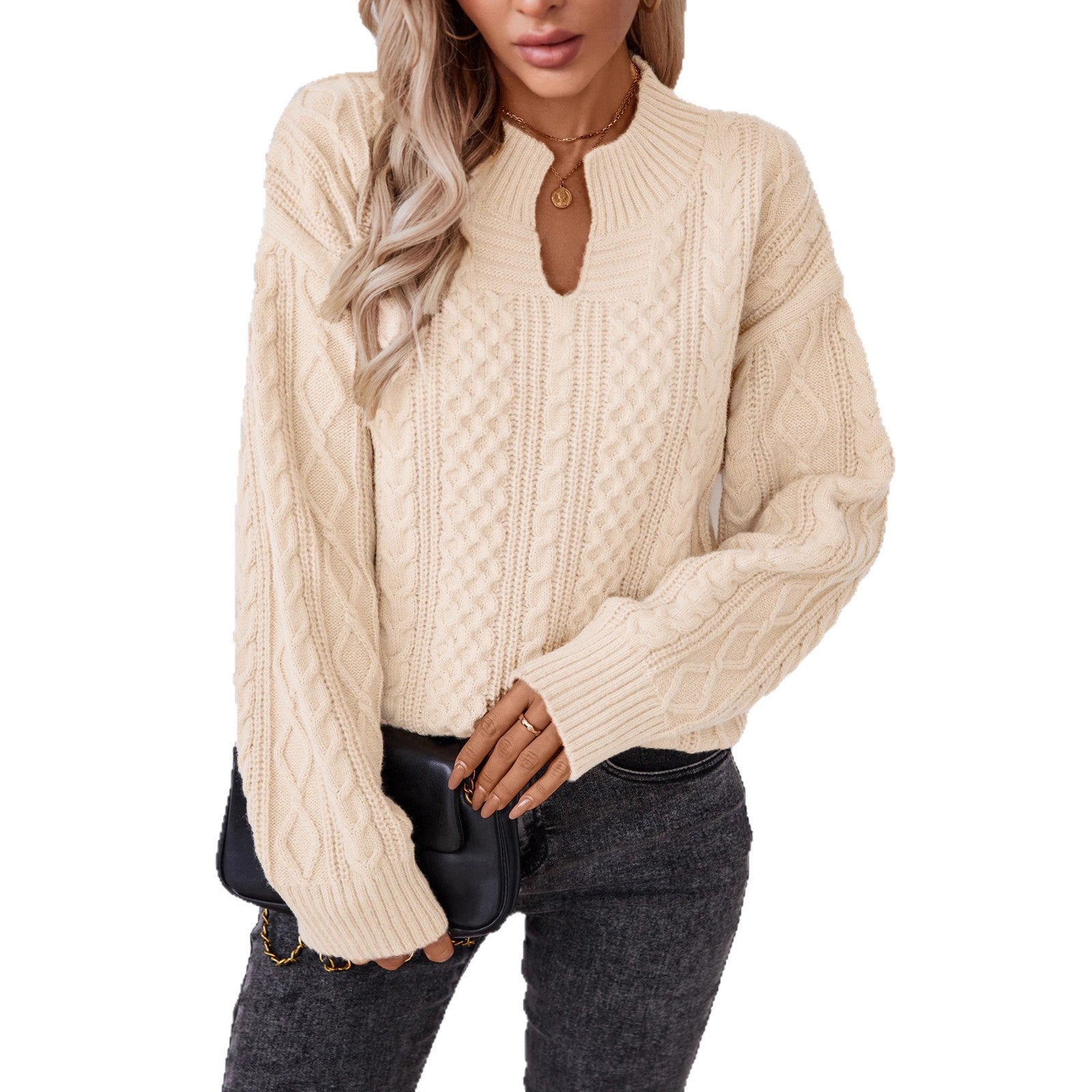 Ladies fashionable knit pullover with unique cable design and round neckline