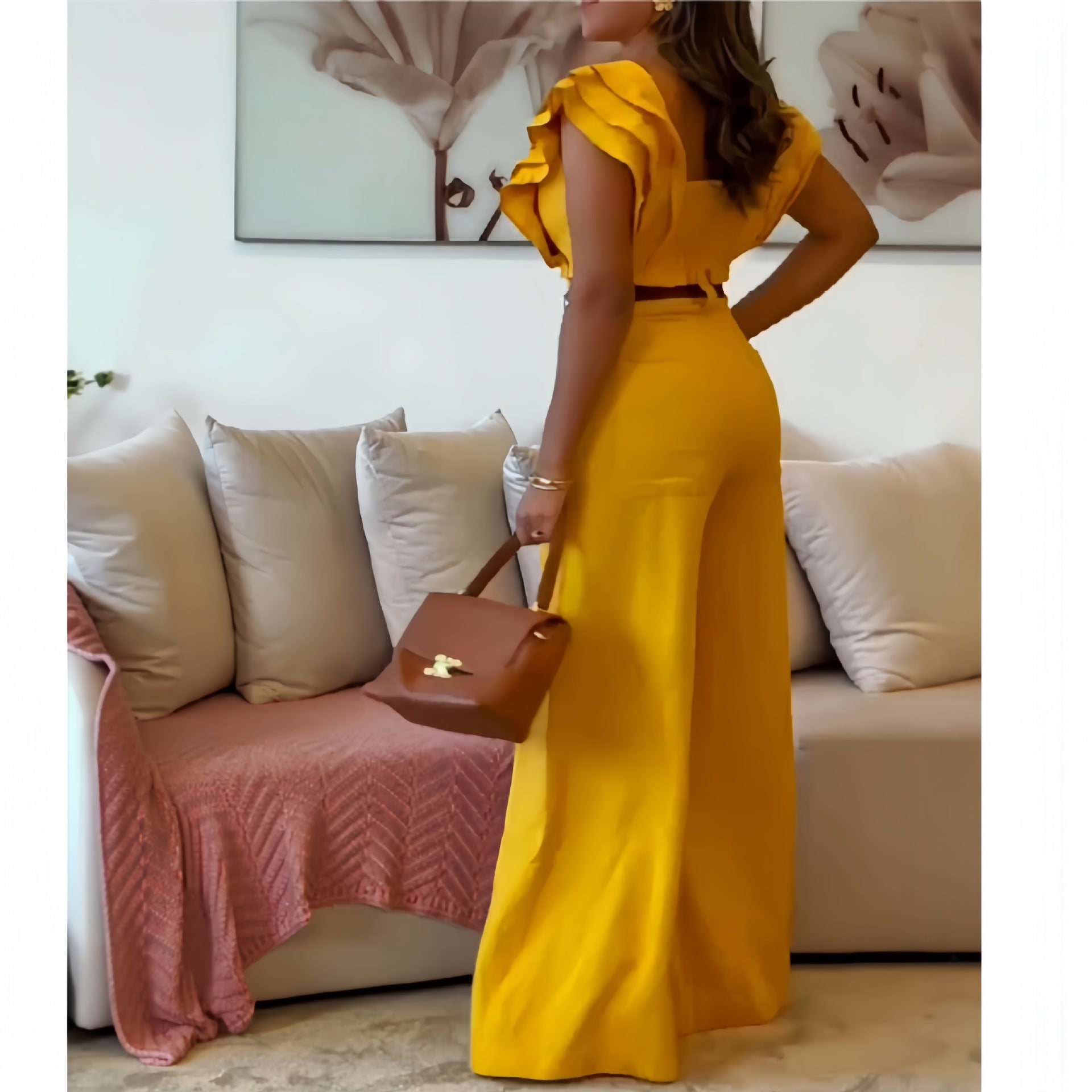 Ladies elegant jumpsuit with voluminous ruffle details