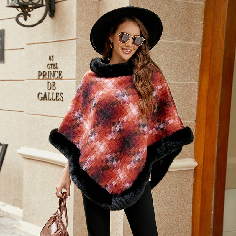 Ladies fashionable poncho with luxurious faux fur collar
