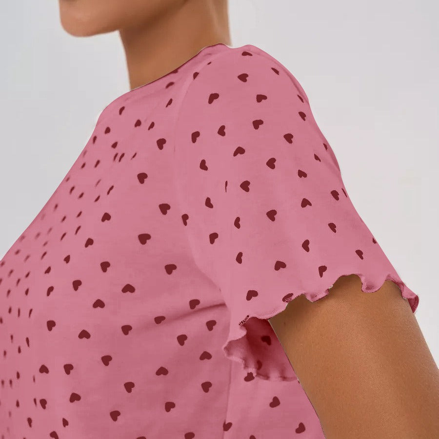 Women's pajama set with playful heart motif and elastic waistband