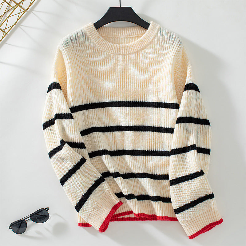 Women's classic knitted pullover with maritime striped pattern and wide cut