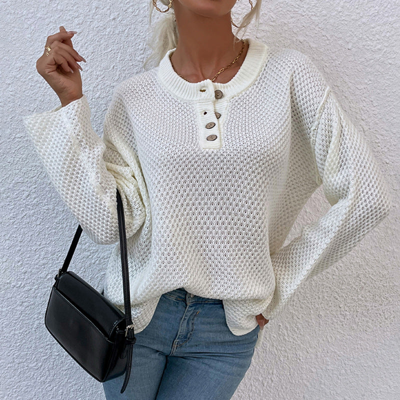 Women's cozy knit pullover with button placket and wide sleeves