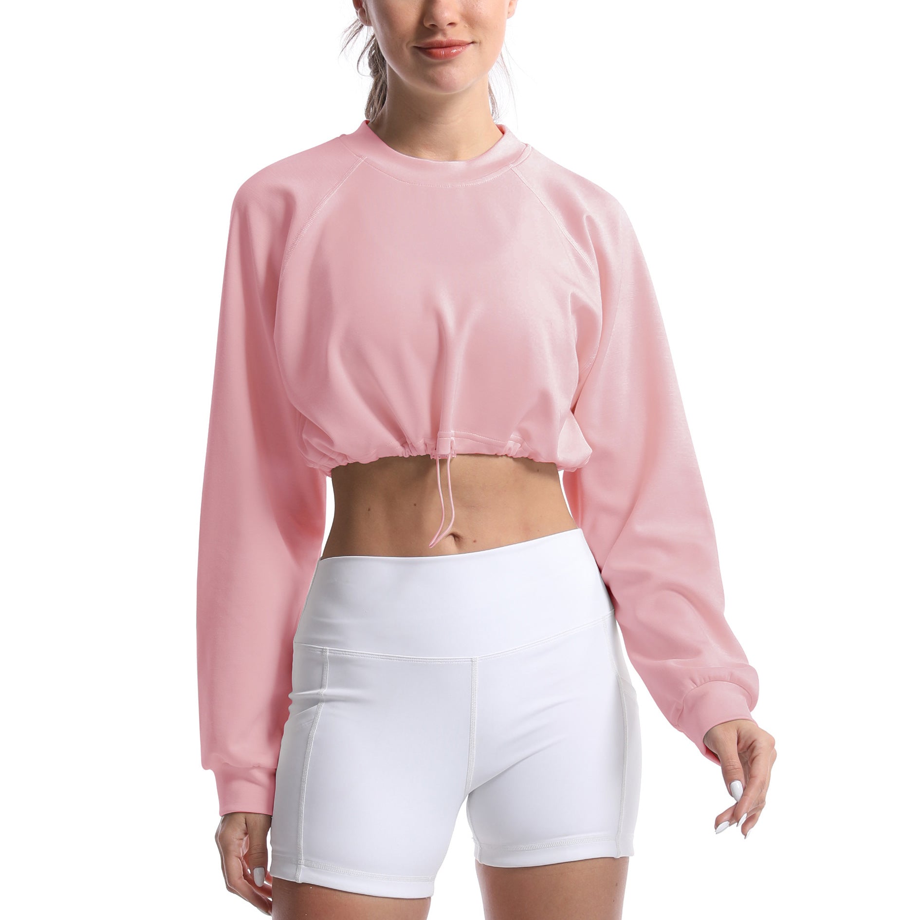 Women's sporty crop pullover with adjustable hem and long sleeves