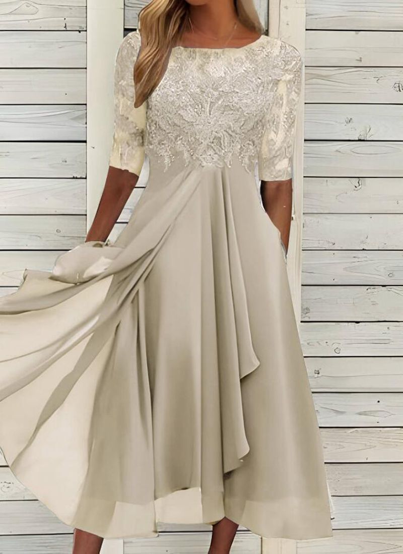 Women's elegant cocktail dress with floral lace top and flowing skirt