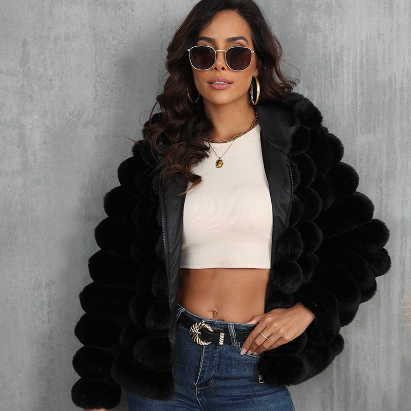 Women's stylish hooded jacket made of faux fur with a textured pattern