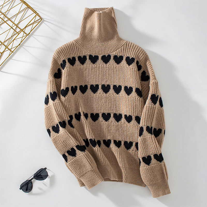 Women's knitted pullover with heart pattern and high collar