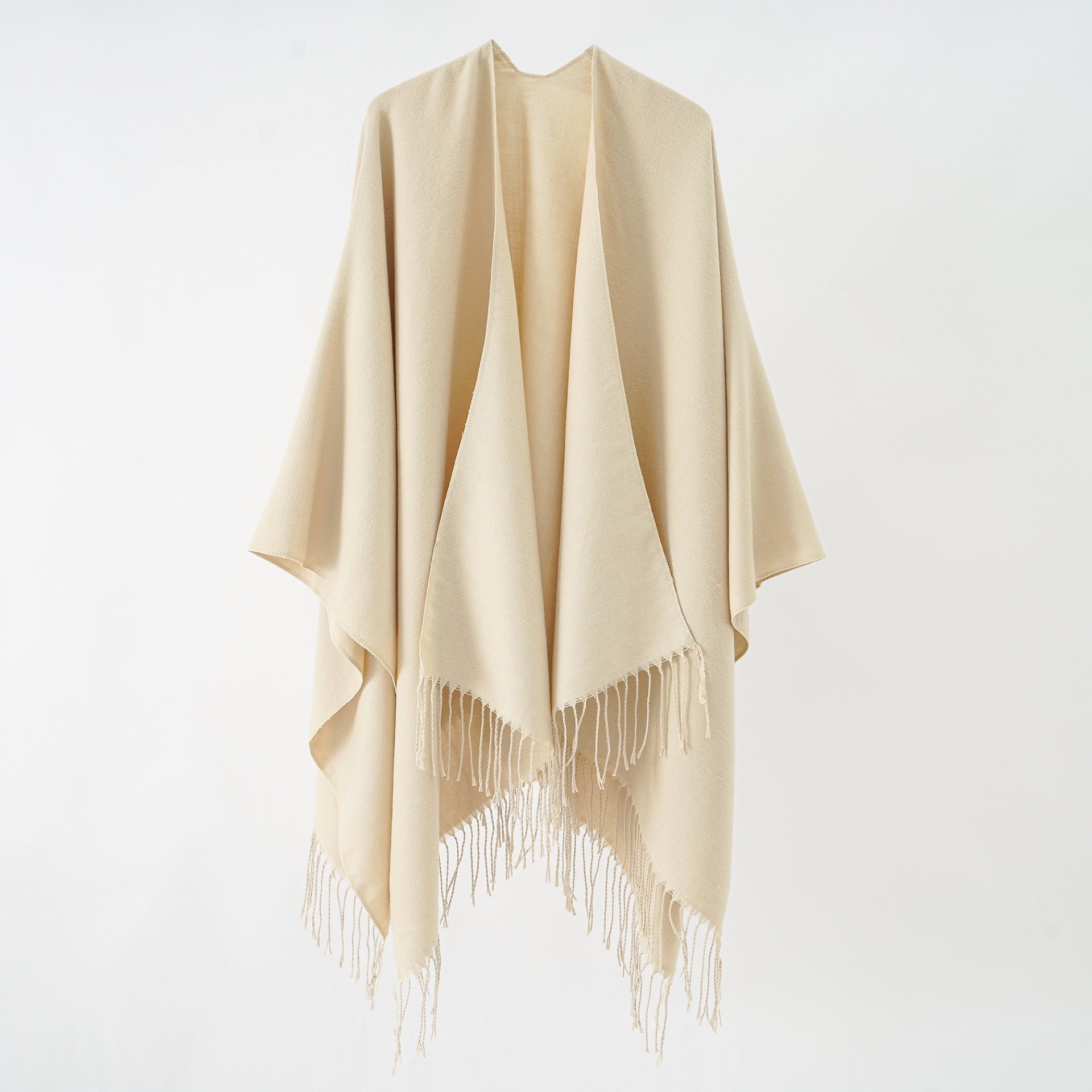 Women's stylish fringe poncho made from soft material with a luxurious drape