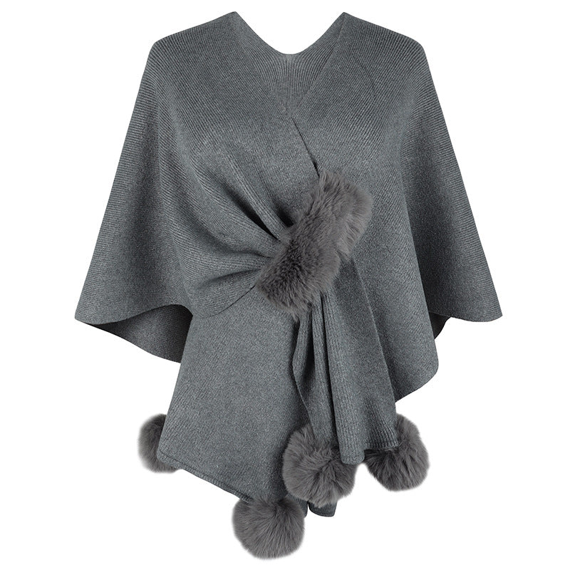 Ladies elegant poncho with luxurious faux fur trim