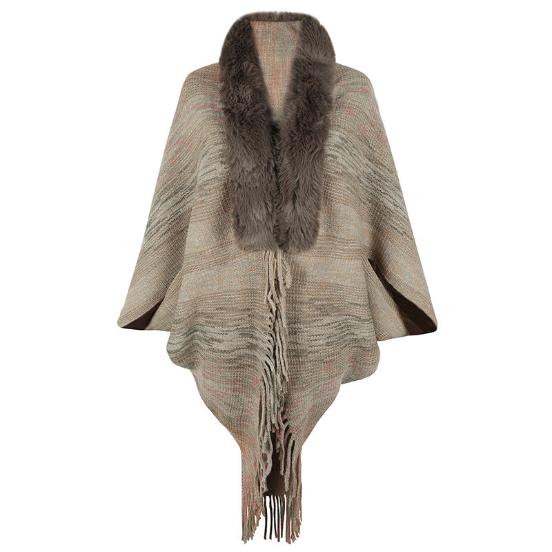 Women elegant poncho with luxurious faux fur collar and fringed hem