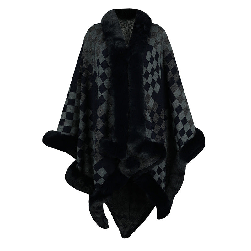 Ladies elegant knitted poncho with luxurious faux fur trim and geometric pattern