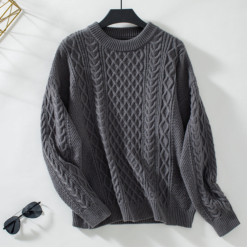 Ladies chunky knit pullover with sophisticated cable pattern and round neckline
