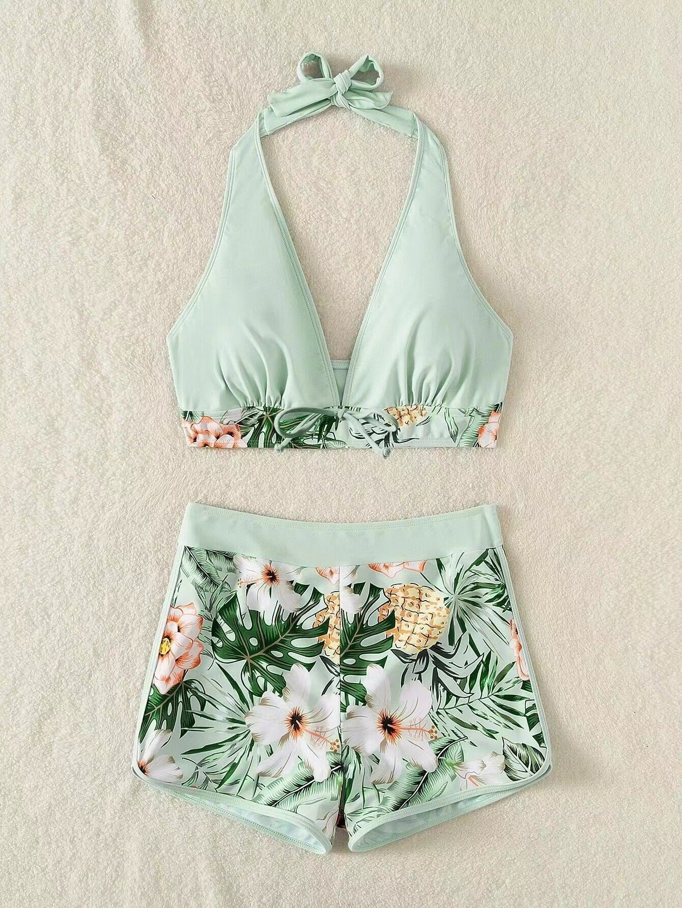 Women's sporty bikini set with braided top and patterned shorts