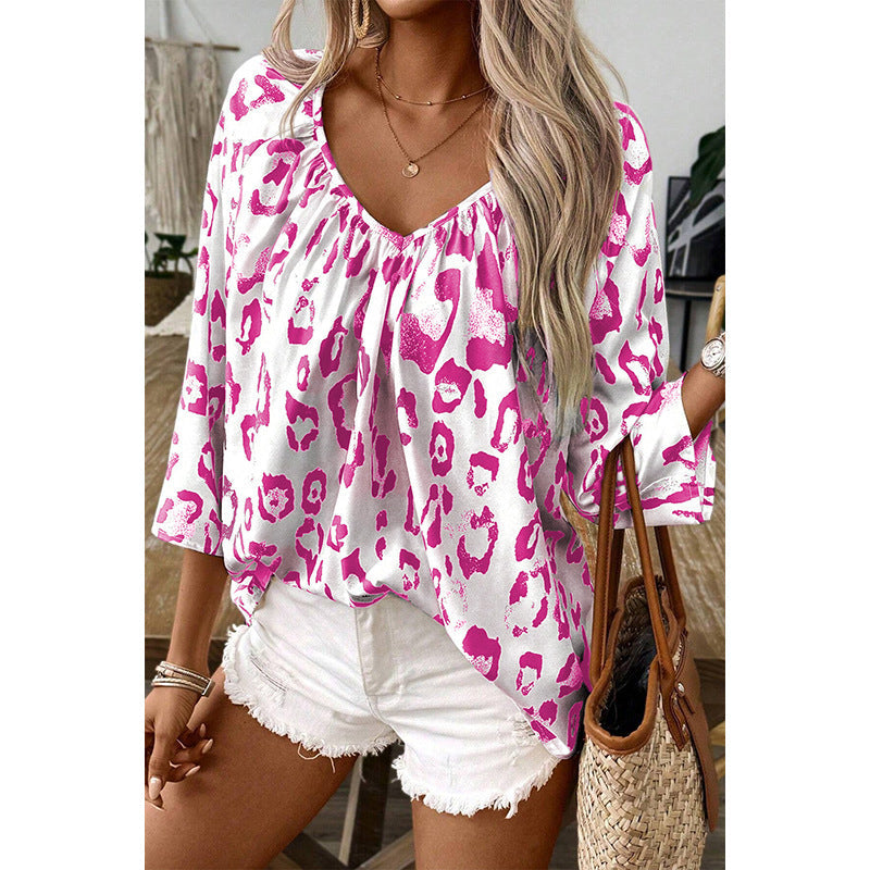 Ladies blouse top with a loose fit and chic leopard print