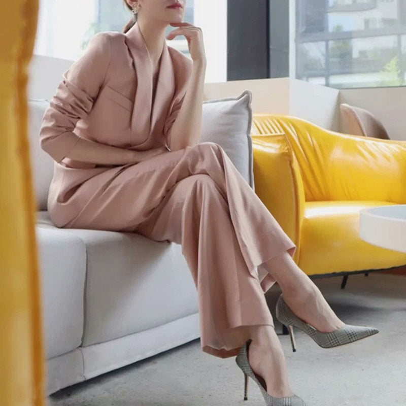 Women elegant tailored blazer and wide trouser suit