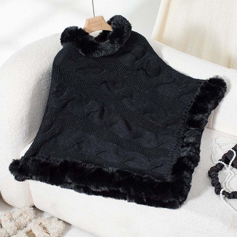 Women's cozy knit poncho with soft faux fur trim and cable knit pattern