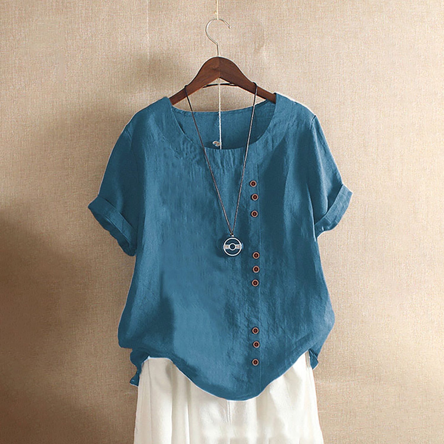 Women's casual linen blouse with convertible sleeves and button details