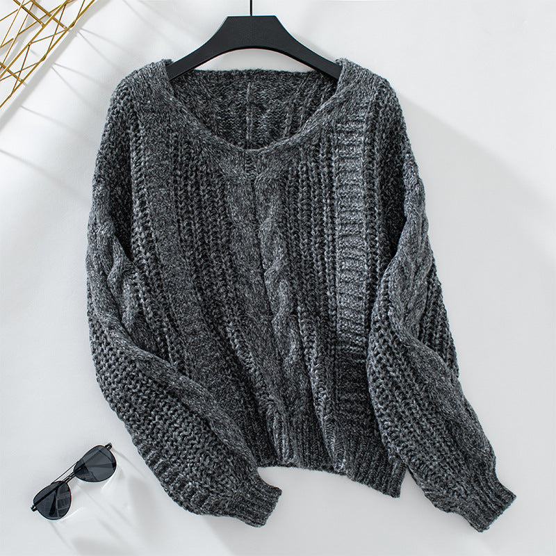 Ladies chunky knit pullover with oversized cut and cable pattern