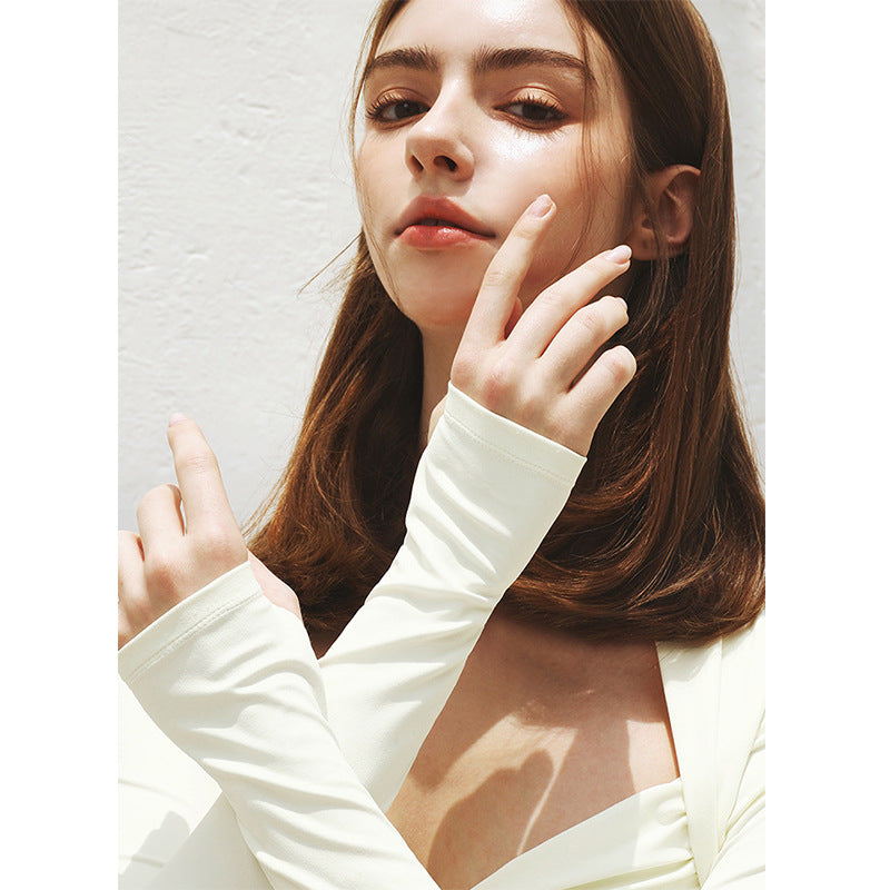 Women's elegant long sleeve crop top with sophisticated wrap detail and high comfort