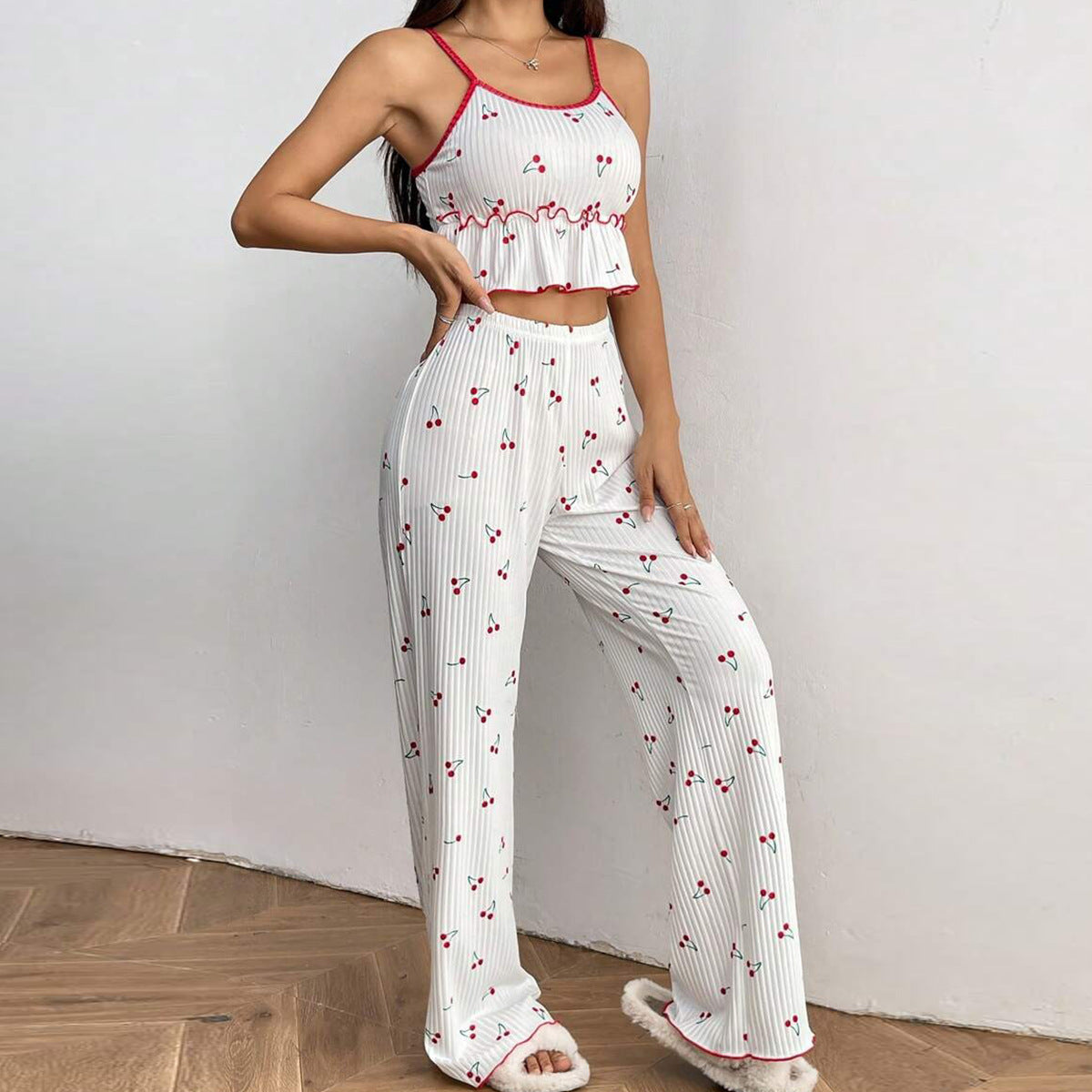 Ladies pajama set with fruity strawberry pattern and ruffle details