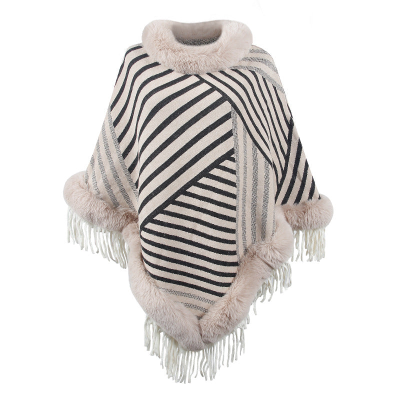 Ladies fashionable poncho with elegant fringe decoration