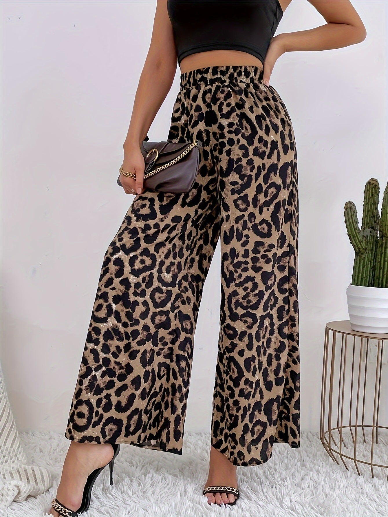 Women's Wide Leopard Pants made of flowing material with elastic waistband