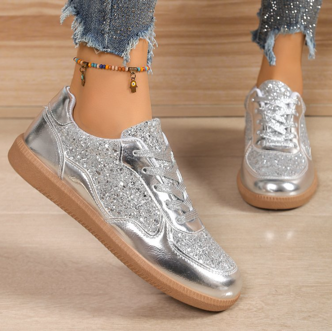 Ladies fashionable sneakers with shimmering upper material and non-slip sole