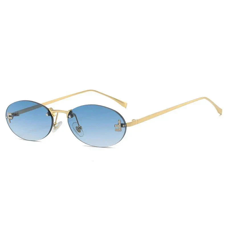 Oval Sunglasses With Golden Accents and Subtle Stones