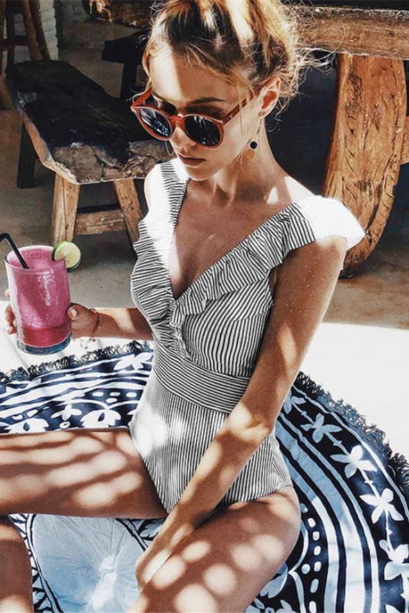Striped swimsuit with ruffle details